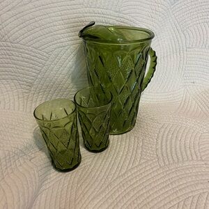 Vintage green glass, pitcher, and two glasses